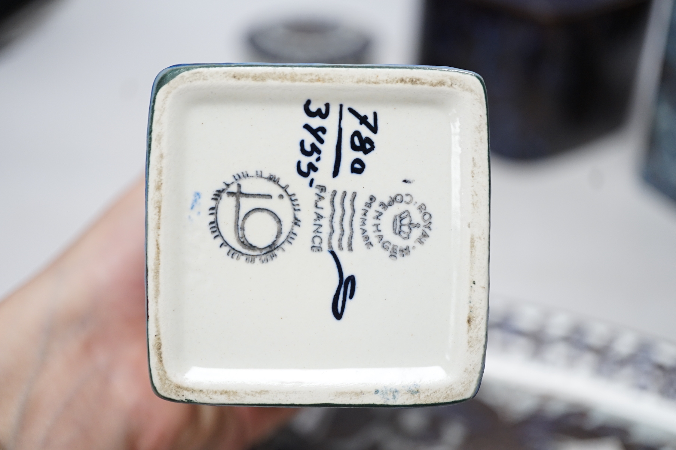 A pair of Royal Copenhagen pottery ‘fajance’ blue glaze vases and a squat jar and cover, together with an Alumina ware larger jar and cover and a rectangular tray signed CK, tallest 19cm